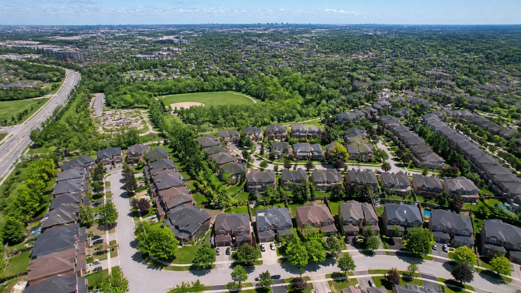 An aerial view of a green, well-organized suburban neighbourhood in York Region.