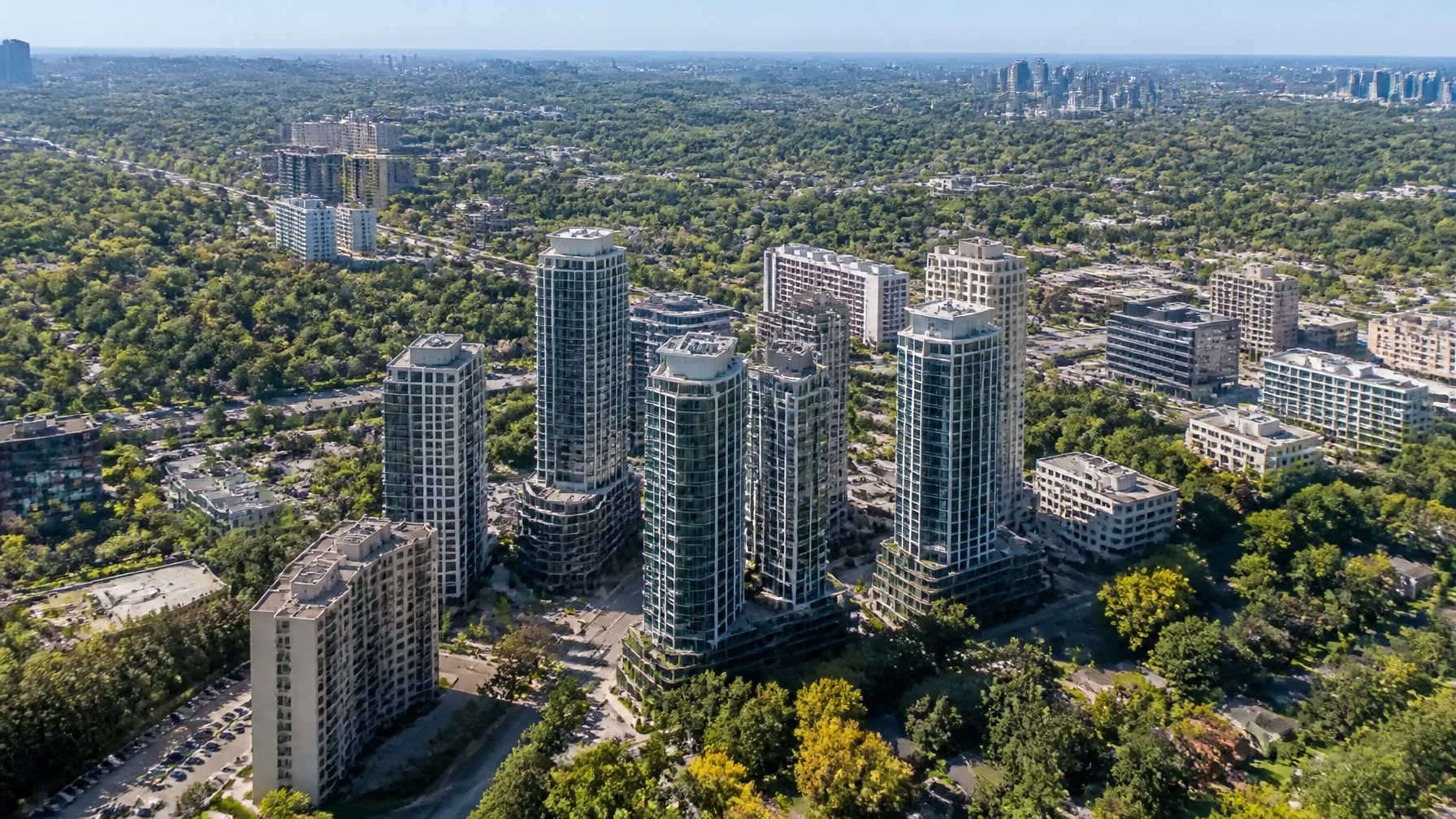Aerial view of North York with modern condo towers among greenery